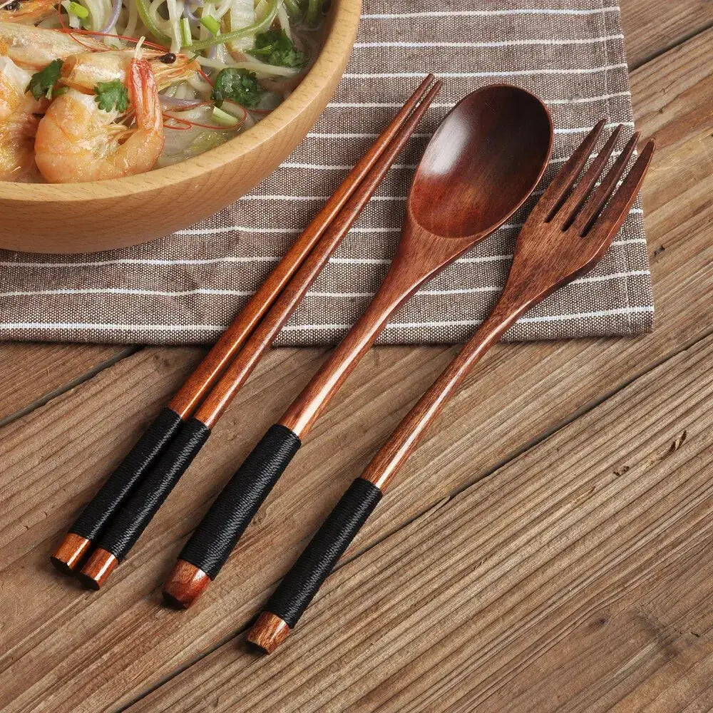 Noni 3-Piece Cutlery Set on a striped placemat