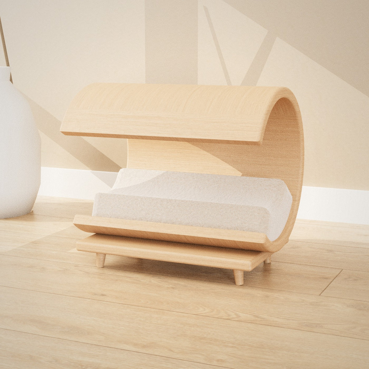 Tsuki Cat Lounger: crescent bentwood cat lounger with a grey bouclé cushion on an oak base, seen from the side