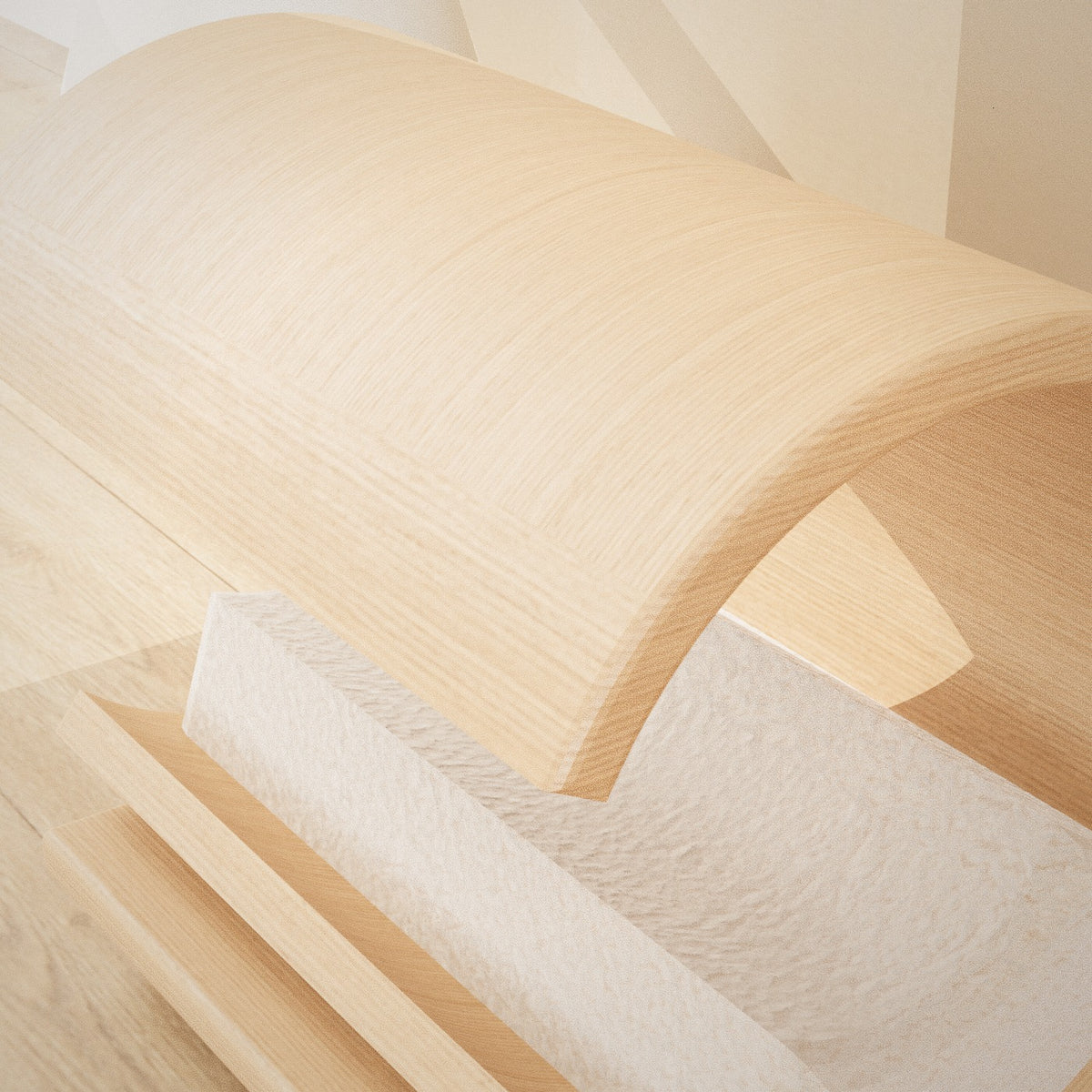 Tsuki Cat Lounger: crescent bentwood cat lounger with a grey bouclé cushion on an oak base, close-up of the cushion and wood finish