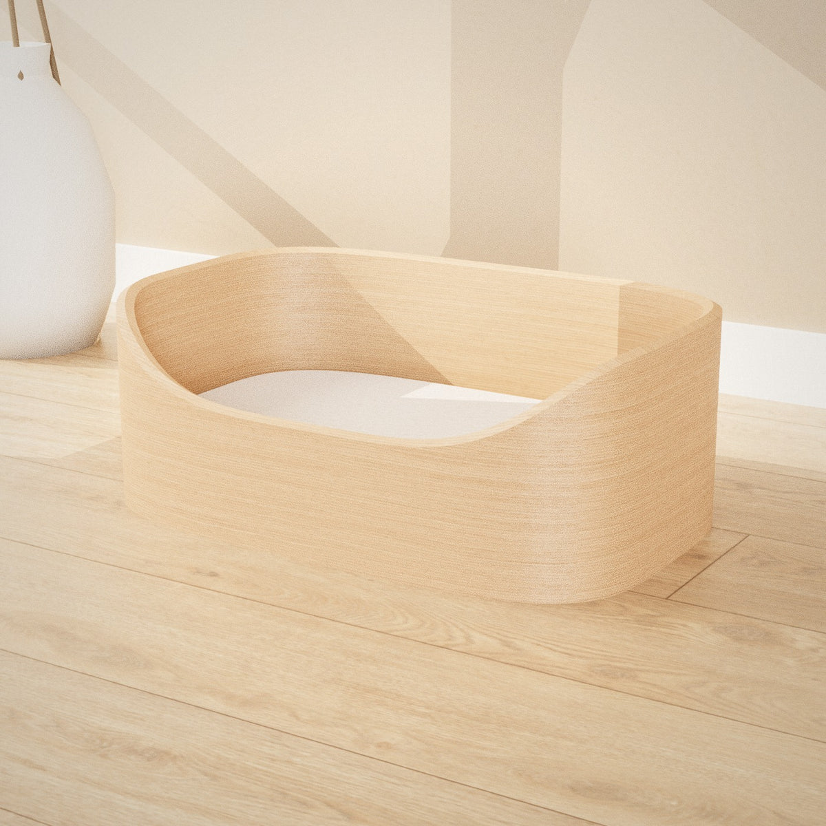Maru Pet Bed: curved bentwood pet bed with a soft grey cushion