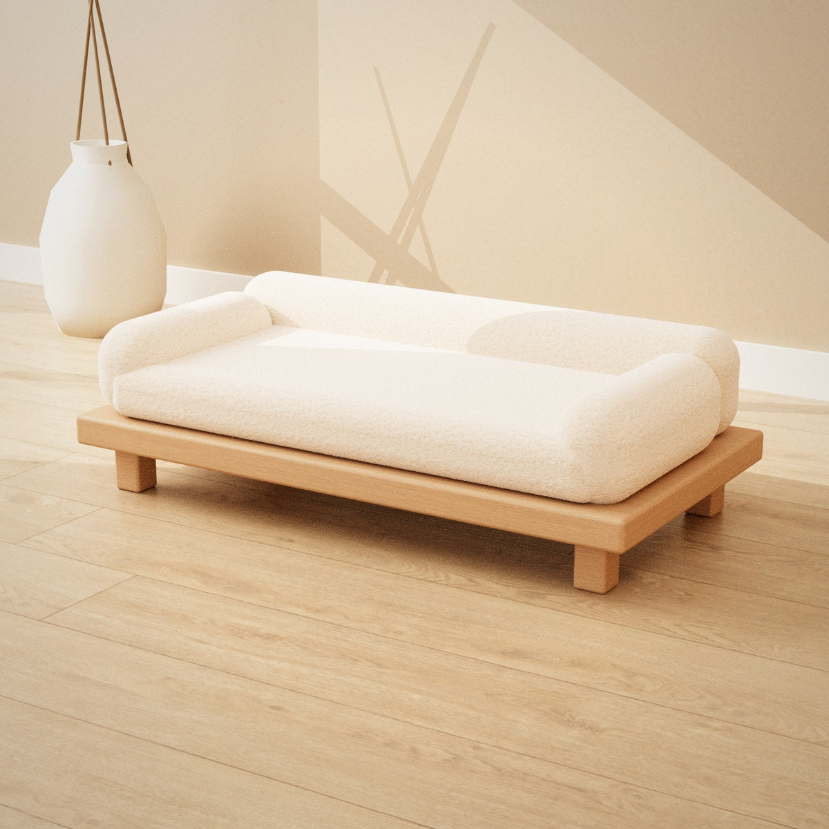 Shiro Pet Sofa: low oak pet sofa with a cream bouclé cushion and bolster sides